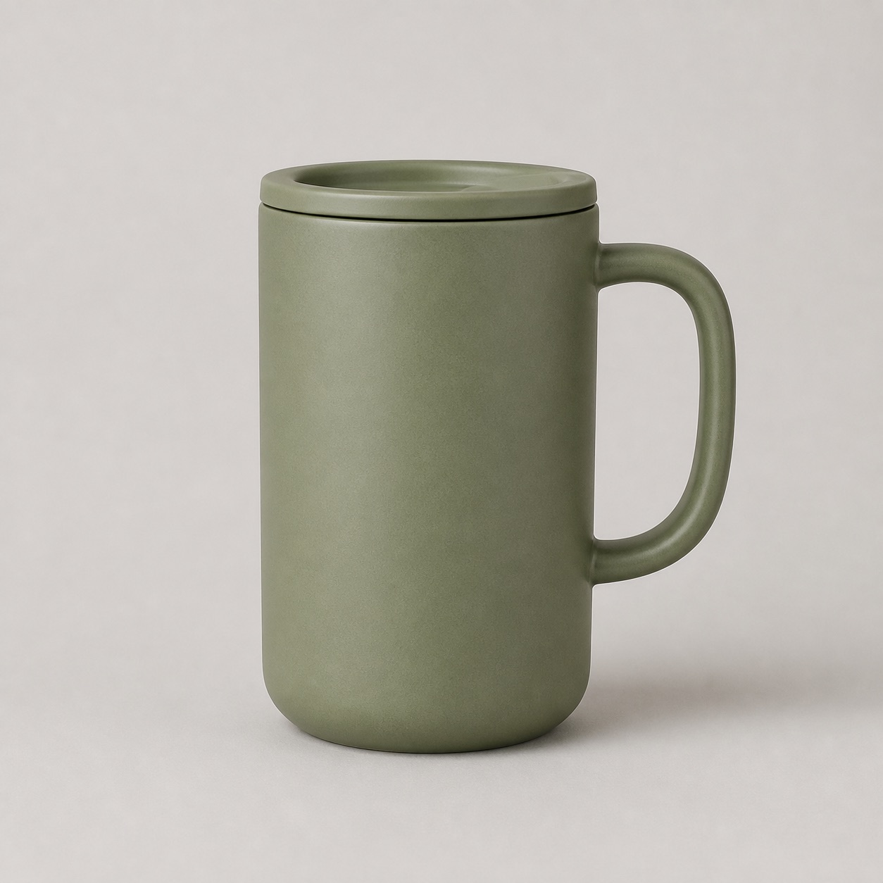 Square source photo of a sage ceramic mug